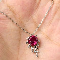 This is a gorgeous handmade creation. Its beauty is its simplicity & Elegance.  The 8*8mm round shape ruby is crafted in solid sterling silver and with rhodium plated. All item is sent in a beautiful gift box You can realize more lovely stuff clicking the link https://www.etsy.com/shop/knightjewelry?refshopsection_shophome_leftnav Please leave the correct address and you phone number for delivering successfully. Fine Silver Ruby Jewelry, White Gold Ruby Jewelry Gift, White Gold Ruby Birthstone Necklace, Ruby Necklace With Prong Setting As Gift, Valentine's Day Round Jewelry With Polished Finish, Sterling Silver Jewelry With Red Birthstone, Silver Ruby Gemstone Jewelry, Sterling Silver Round Birthstone Necklace, Ruby Birthstone Necklaces