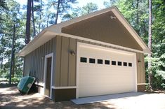 a garage in the middle of a wooded area