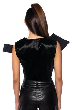 Unique. That’s what you are in The AKIRA Label Binx Abstract Cut Out Top. Get ready to turn heads in this geometric piece made from a non-stretch structured base fabrication. It features an asymmetrical neckline and silhouette, a geometric pattern with cage cutouts at the front, smooth, reflective texture, and a side zipper closure. Style over a matching bodycon maxi skirt for an effortless, ethereal look. - Shell: 55% PU 45% Rayon, 100% Cotton (all measurements approximate from size small) - 16.5” Shoulder to Hem - Imported Product ID: 357402 Bodycon Maxi Skirt, Cut Out Top, Asymmetrical Neckline, Side Zipper, Maxi Skirt, Cut Out, Geometric Pattern, Crop Tops, Texture