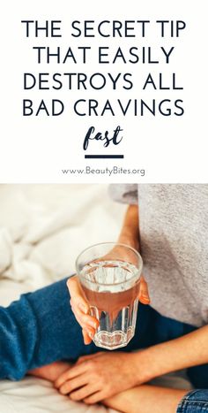 a woman holding a glass with liquid in it and the words, the secret tip that easily destroys all bad cravings fast