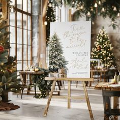 a welcome sign in front of a christmas tree