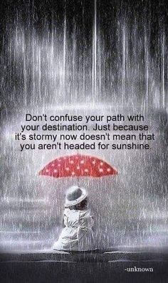 a person sitting in the rain with an umbrella and saying don't confue your path with your destination just because it's stormy now doesn't mean that you are you aren't headed for sunshine