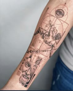 a man's arm with tattoos on it and an eye in the center is shown