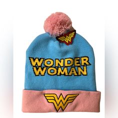 This Cozy Wonder Women Winter Hat Has Very Unique Baby Pink And Baby Blue Colors. It Is New With Tags, Soft And Stretchy. #Wonderwoman #Dccomics #Superman #Batman #Dc #Justiceleague #Dcuniverse #Aquaman #Galgadot #Comics #Flash #Dceu #Theflash #Marvel #Joker #Dianaprince #Ww #Harleyquinn #Greenlantern #Love #Cyborg #Art #Cosplay #Superhero #Spiderman #Henrycavill #Supergirl #Brucewayne #Zacksnyder #Avengers #Girlpower #Girl #Love #Girls #Womenempowerment #Girlboss #Fashion #Instagood #Women #Bea Trendy Warm Blue Hats, Novelty Pink Hat With Letter Print, Pink And Purple Super Hero Accessories, Playful Pink Hat With Letter Print, Pink Novelty Hat With Letter Print, Playful Pink Hats With Letter Print, Trendy Blue One Size Beanie, Cute Blue Beanie Hat, Trendy Blue Beanie One Size