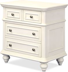 a white dresser with three drawers on one side and two doors on the other end