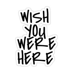 the words wish you were here written in black ink on a white sticker sheet