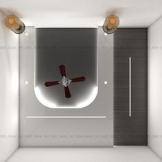 an overhead view of a ceiling fan in a room with white walls and flooring