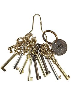 a bunch of keys that are laying on top of each other