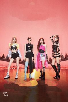 four girls standing in front of a pink wall wearing short skirts and knee high boots