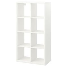 a white bookcase with four shelves on each side