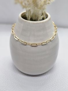 This dainty gold filled paperclip bracelet feels as luxurious as it looks! Made with the highest quality materials. If you have another length/style/color in mind let us make a custom bracelet for you! 💙 Check out our website! www.macysbraceletsllc.com  Any questions can be emailed to: Macysbraceletsllc@gmail.com Thank you for viewing our product! Gold Paperclip Bracelet With Lobster Clasp, Minimalist Gold Paperclip Bracelet With Lobster Clasp, 14k Gold Filled Adjustable Paperclip Bracelet, Gold Paperclip Bracelet For Everyday, Gold Paperclip Everyday Bracelet, Adjustable 14k Gold-filled Paperclip Bracelet With Delicate Chain, Gold Link Paperclip Bracelet As Gift, Dainty 14k Gold Filled Paperclip Bracelet For Everyday, Adjustable 14k Gold-filled Paperclip Chain Bracelet