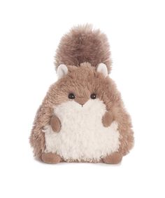 a small stuffed animal with big ears on it's head and tail, sitting in front of a white background