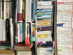 there are many books stacked on top of each other in this bookcase, and one is full of them