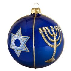 a blue ornament with a menorah on it