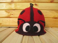 Funny hat for girl, women. Sauna bath cap- Ladybird. REMEMBER! The felting process takes time, so I kindly ask You to be patient and wait about 3-5 days for your item to be made and prepared for shipment. The sauna hat ensures excellent heat protection to head. Highly eye-catching and joyful. Color - red and black. Benefits * Protects head and hair for maximum comfort * Unique, special and made with love * Has not been subject to saving on materials and working time * Ideal for a respectable hig Red Novelty Hat One Size Fits Most, Red Novelty Hat One Size, Red Novelty Hat, Novelty Red Cap Hat, Red Themed Cap Hat, Themed Red Cap, Red Fun Cap Costume Hat, Red Fun Cap Costume Hats And Headpieces, Fun Red Costume Cap