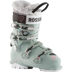 a pair of ski boots with white and black trims