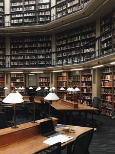 a library filled with lots of books and desks