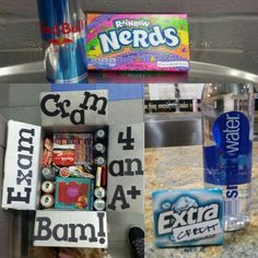 some random items are sitting on top of a metal table in front of a soda can