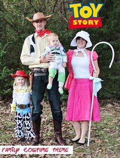 a family dressed up as toy story characters for halloween costume day in the woods with an adult holding a baby