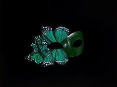 Emerald Green Masquerade Mask inspired by green butterflies, perfect for elegant masquerade occasions! I N C L U D E D Masks come with satin ribbons attached.   S H I P P I N G -  Processed same day or within 24 hours.  1-2 day guaranteed delivery, add item to cart, click shipping tab for rates.  Pls leave a check out note with your need date & contact number  Msg for delivery time frames (Include your state/country) S I Z E  Adult size. Dimensions available upon request.  C U S T O M I Z A T I Green Masquerade Mask, Emerald Green Butterfly, Butterfly Masquerade Mask, Butterfly Masquerade, Artist Mood Board, Elegant Face Mask, Green Butterflies, Thank You Wishes, Ball Mask