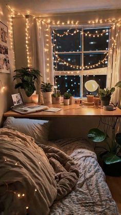 The combination of lights, decorations, and the wooden furniture creates an inviting atmosphere filled with warmth and holiday cheer. Small Fairy Lights Bedroom Ideas, Dairy Lights Bedroom, Fairy Lights Plants Bedroom, Fairy Lights Cute, Fairy Lights Office, Cute Desk Lamp, Desk Fairy, Cozy Lights, Dorm Lighting