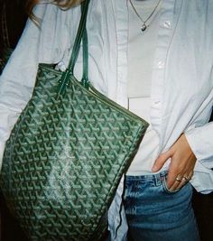 Goyard vs Louis Vuitton, which brand is better for you? Check this post for everything you need to know about these two fashion brands, detailed comparisons between the iconic products from Goyard and Louis Vuitton, including reviews of Louis Vuitton Neverfull vs Goyard Boho Bag, and more LV bags and Goyard handbags. Green Goyard Tote Outfit, Goyard Tote Aesthetic, Green Goyard Tote, Goyard Bag Outfit, Goyard Aesthetic, Goyard Tote Outfit, Goyard Purse, Green Goyard, Louis Vuitton 2023