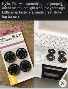 some black buttons sitting on top of a white counter next to a package of them