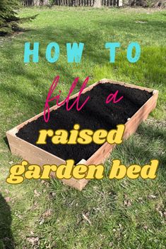 a raised garden bed in the grass with text overlay that reads how to fill a raised garden bed