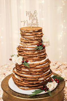 a wedding cake made out of cookies and flowers