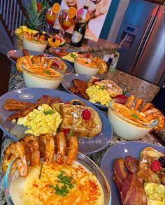 several plates of food on a counter top