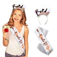 a beautiful young woman holding a flower and wearing a sash with the word bride on it