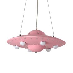 a pink light fixture with white balls hanging from it's sides and two lights on each side