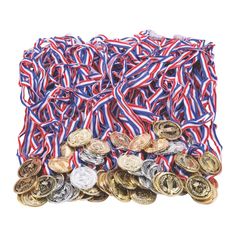 a pile of coins and ribbons on a white background