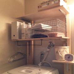 a washer and dryer in a small room