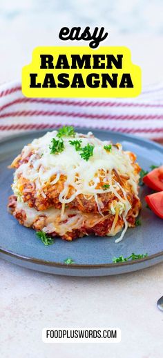 a blue plate topped with lasagna covered in cheese