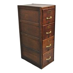 an old wooden file cabinet with four drawers