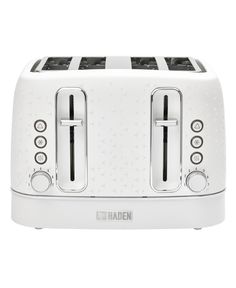 a white toaster with two slices cut in half and the words maden on it