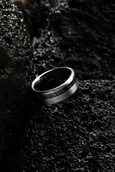 a ring sitting on top of a rock