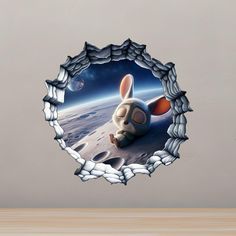 a wall sticker with an image of a rabbit in space