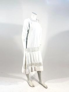 For Sale on 1stDibs - 1920s white ribbed cotton day dress featuring a dropped waist band of hand crochet border that corresponds with the crochet on the elbow cuffs, skirt border, 1920s Day Dress, Crochet Border, 20s Fashion, Crochet Borders, Cotton Crochet, Dress For Sale, Day Dress, Hand Crochet, Cotton Dresses