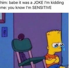 the simpsons is sitting in a chair and crying