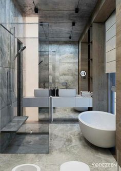 a bathroom with a large bathtub next to a walk in shower