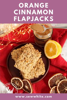 orange cinnamon flapjacks on a plate next to an orange slice