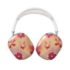 a pair of headphones with flowers on them