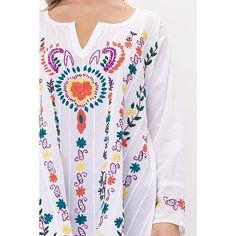 Raj Kaya Embroidered Tunic  Paired with well-worn denim or tailored shorts, this embroidered tunic brings easy, breezy style to every look.         Boat neck with v      Full length sleeves     Relaxed fit     Embroidered design     52% Cotton 48% Viscose     Machine wash, tumble dry     Imported Casual V-neck Embroidered Top With Multicolor Embroidery, Spring V-neck Top With Geometric Embroidery, Spring V-neck Chikankari Embroidered Top, Casual Blouse With Geometric Embroidery For Spring, Multicolor Embroidered V-neck Top For Vacation, Summer V-neck Tunic With Chikankari Embroidery, Long Sleeve Embroidered Top For Summer, Spring Floral Embroidered Tunic Blouse, Casual Cotton Tunic For Spring