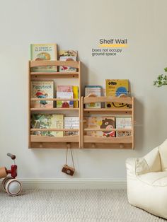 a child's room with bookshelves and toys on the wall next to a chair