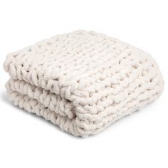 two white blankets stacked on top of each other in front of a white background,