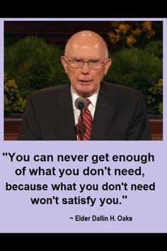 an older man in a suit and tie with a quote on it