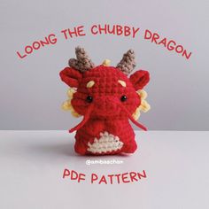 a crocheted red stuffed animal with horns on it's head and the words, long the chubby dragon