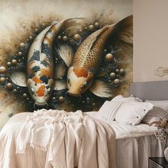 two koi fish are depicted in this artistic painting on the wall above a bed